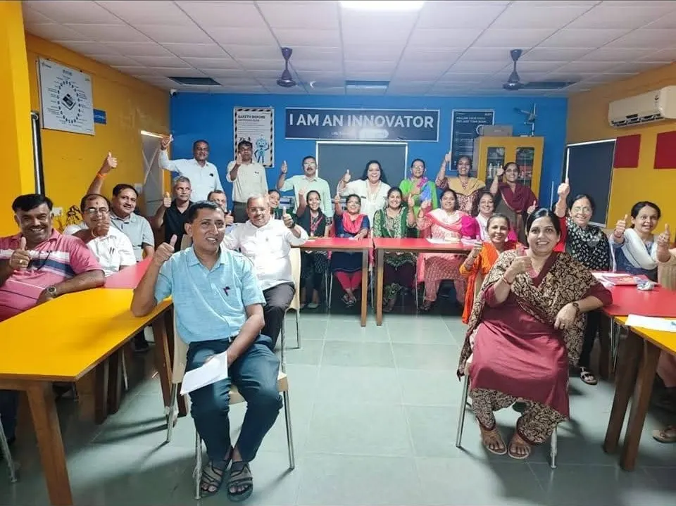 Workshop participants raising their hands